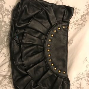 Also black “fancy” pleather clutch.